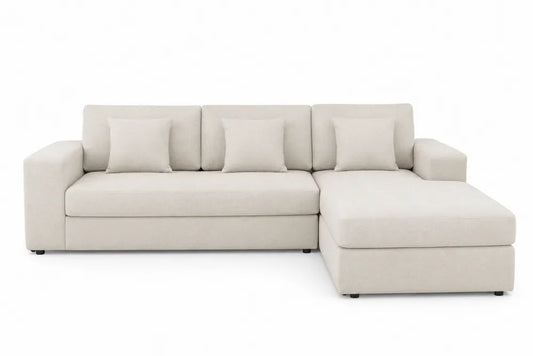 Sofa narożna z szezlongiem i poduszkami, kremowa